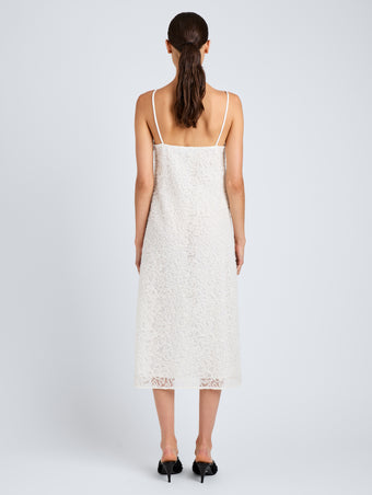 Proenza Schouler Back full length image of model wearing Virginie Dress in Fringe Embroidery in Off White