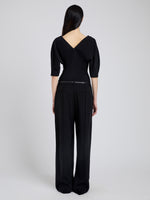 Proenza Schouler Back full length image of model wearing Darena Top in Compact Stretch Crepe in Black