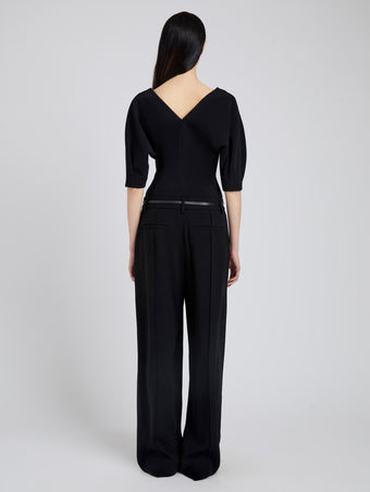 Proenza Schouler Back full length image of model wearing Darena Top in Compact Stretch Crepe in Black