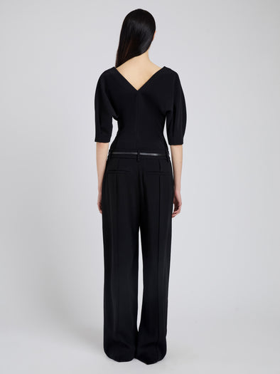Proenza Schouler Back full length image of model wearing Darena Top in Compact Stretch Crepe in Black