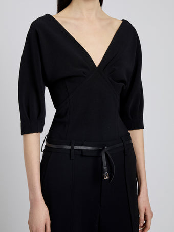 Proenza Schouler Detail image of model wearing Darena Top in Compact Stretch Crepe in Black
