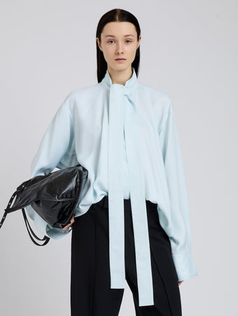 Proenza Schouler Front cropped image of model wearing Ricky Top in Viscose Gabardine in Sky