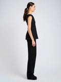 Proenza Schouler Side full length image of model wearing Mariam Top in Wool Scuba in Black