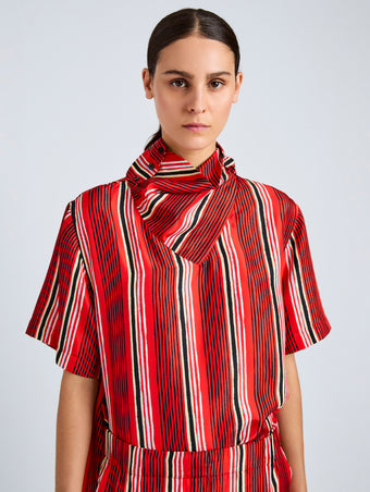 Proenza Schouler Detail image of model wearing Amira Top in Printed Silk Habotai in Vermillion Multi