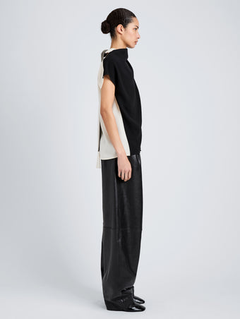 Proenza Schouler Side full length image of model wearing Elsa Top in Matte Double Crepe in Black Multi