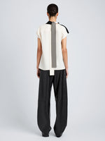 Proenza Schouler Back full length image of model wearing Elsa Top in Matte Double Crepe in Black Multi