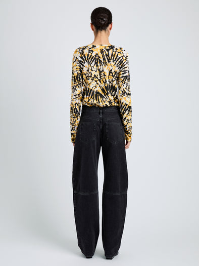 Proenza Schouler Back full length image of model wearing Mia Top in Tie Dye Tissue Jersey in Sun Multi