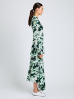 Proenza Schouler Side full length image of model wearing Joelle Skirt in Printed Silk Viscose in Dark Green Multi