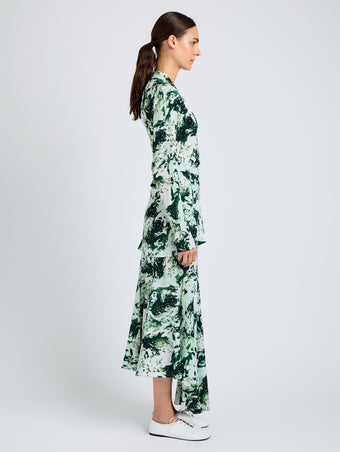 Proenza Schouler Side full length image of model wearing Joelle Skirt in Printed Silk Viscose in Dark Green Multi
