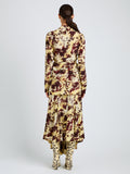 Proenza Schouler Back full length image of model wearing Joelle Skirt in Printed Silk Viscose in Rust Multi