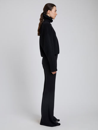 Proenza Schouler Side full length image of model wearing Kalea Pant in Compact Stretch Crepe in Black