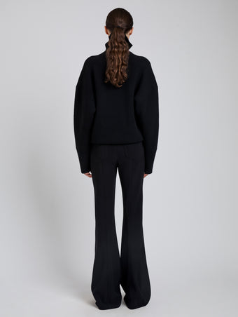 Proenza Schouler Back full length image of model wearing Kalea Pant in Compact Stretch Crepe in Black