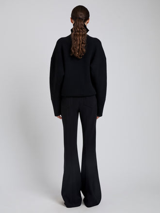 Proenza Schouler Back full length image of model wearing Kalea Pant in Compact Stretch Crepe in Black