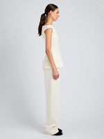 Proenza Schouler Side full length image of model wearing Zee Pant in Wool Scuba in Off White