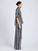 Proenza Schouler Side full length image of model wearing Amira Pant in Printed Silk Habotai in Black Multi