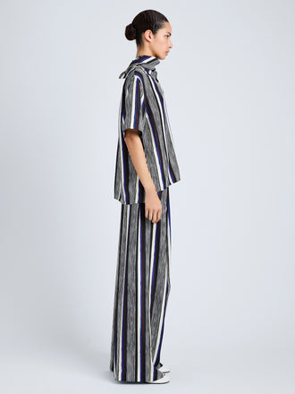 Proenza Schouler Side full length image of model wearing Amira Pant in Printed Silk Habotai in Black Multi