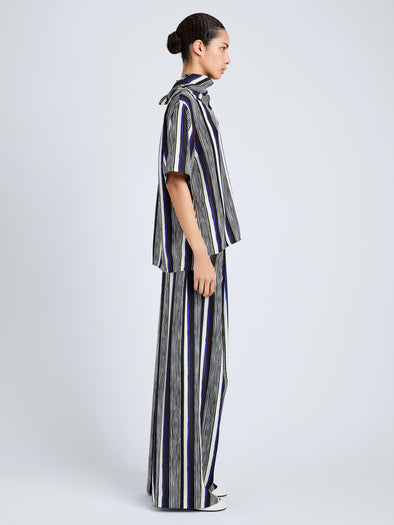 Proenza Schouler Side full length image of model wearing Amira Pant in Printed Silk Habotai in Black Multi