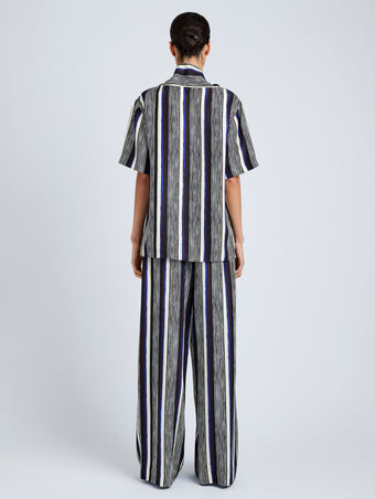 Proenza Schouler Back full length image of model wearing Amira Pant in Printed Silk Habotai in Black Multi