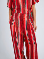 Proenza Schouler Detail image of model wearing Amira Pant in Printed Silk Habotai in Vermillion Multi