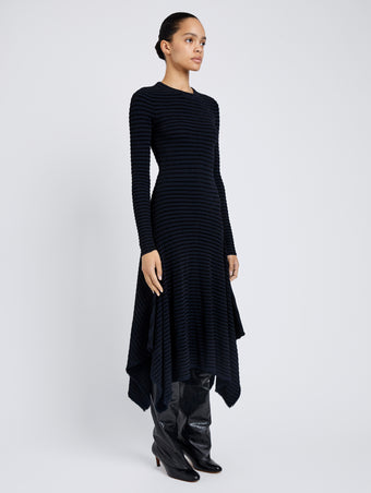 Proenza Schouler side image of model wearing Didi Dress in Matte Viscose Velvet Stripe in navy/black