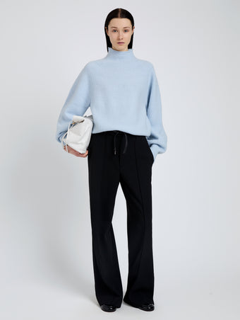 Proenza Schouler Front full length image of model wearing Adley Top in Solid Cashmere Blend in Light Blue
