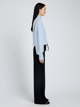 Proenza Schouler Side full length image of model wearing Adley Top in Solid Cashmere Blend in Light Blue