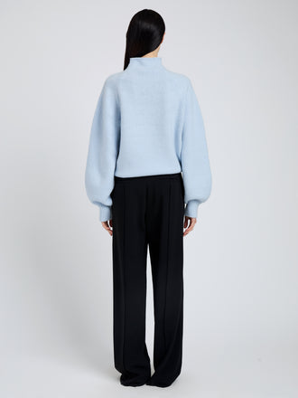 Proenza Schouler Back full length image of model wearing Adley Top in Solid Cashmere Blend in Light Blue