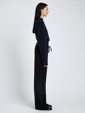 Proenza Schouler Side full length image of model wearing Abie Top in Clean Boiled Wool in Navy