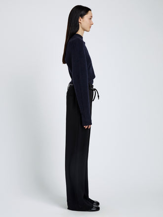 Proenza Schouler Side full length image of model wearing Abie Top in Clean Boiled Wool in Navy