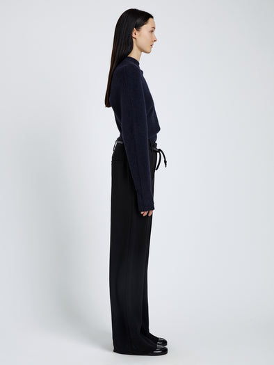 Proenza Schouler Side full length image of model wearing Abie Top in Clean Boiled Wool in Navy