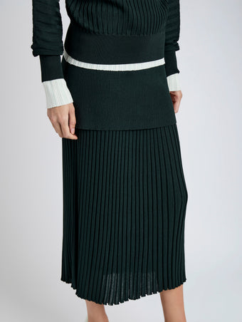 Proenza Schouler Detail image of model wearing Luiza Skirt in Sunburst Rib in Bottle Green