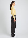 Proenza Schouler Side full length image of model wearing Rocio Cardigan in Cashmere in Pale Yellow