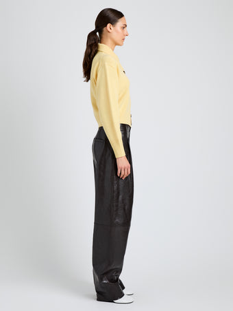 Proenza Schouler Side full length image of model wearing Rocio Cardigan in Cashmere in Pale Yellow