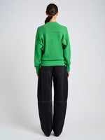 Proenza Schouler Back full length image of model wearing Niccola Top in Cotton Tape Knit in Green