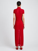 Proenza Schouler Back full length image of model wearing Zein Dress in Geo Textured Knit in Vermillion