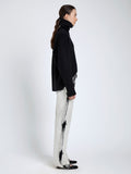 Proenza Schouler side image of model wearing Ryman Jean in Fade Out Black