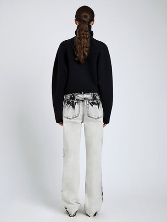 Proenza Schouler Back full length image of model wearing Ryman Jean in Fade Out Black in Black Denim