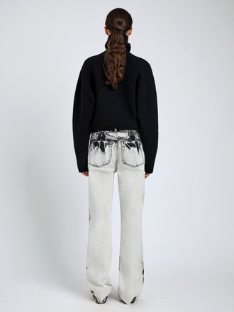 Proenza Schouler Back full length image of model wearing Ryman Jean in Fade Out Black in Black Denim