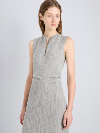 Proenza Schouler Detail image of model wearing Selene Dress in Static Suiting in PlasterBlack