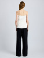 Proenza Schouler Back full length image of model wearing Damea Top in Matte Double Crepe in white