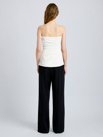 Proenza Schouler Back full length image of model wearing Damea Top in Matte Double Crepe in white