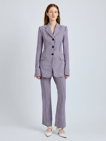 Proenza Schouler Front full length image of model wearing Lorenza Pant in Static Suiting in AubergineWhite