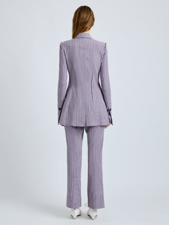 Proenza Schouler Back full length image of model wearing Lorenza Pant in Static Suiting in AubergineWhite
