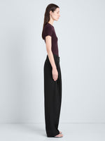 Proenza Schouler Side full length image of model wearing Sky Top in Matte Viscose Rib in Aubergine 