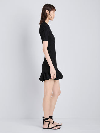 Proenza Schouler Side full length image of model wearing Leandra Dress in Viscose Ribbed Godet in Black