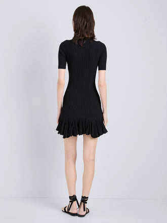 Proenza Schouler Back full length image of model wearing Leandra Dress in Viscose Ribbed Godet in Black