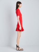Proenza Schouler Side full length image of model wearing Leandra Dress in Viscose Ribbed Godet in Red