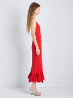 Proenza Schouler Side full length image of model wearing Giuditta Dress in Viscose Ribbed Godet in Red