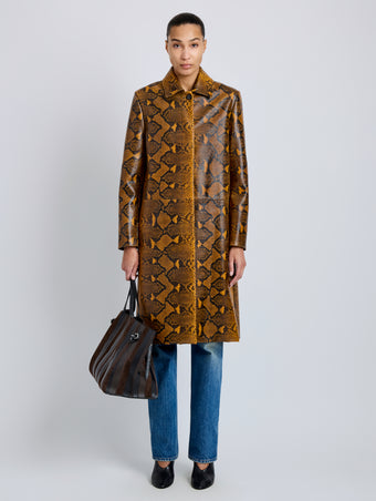 Proenza Schouler Front full length image of model wearing Leticia Coat in Python Print in Gold Multi