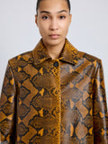 Proenza Schouler Detail image of model wearing Leticia Coat in Python Print in Gold Multi